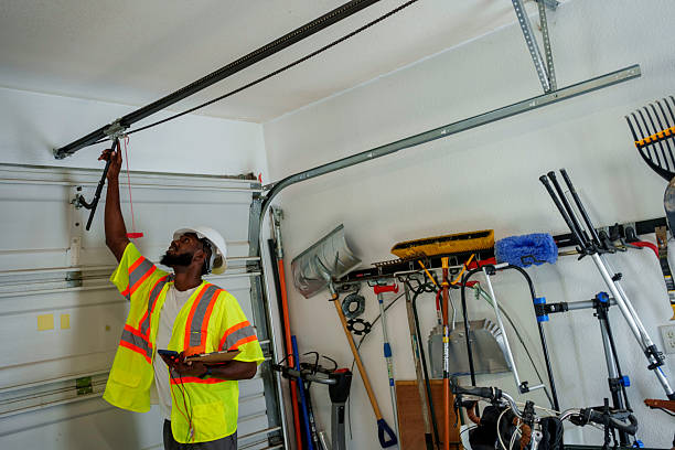 Professional Garage Door Panel Replacement technician working in Akron, NY
